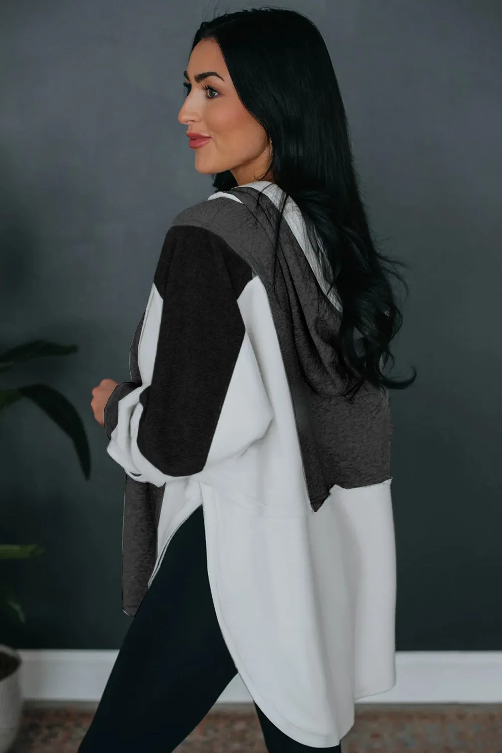 Black Color Block Exposed Seam Buttoned Neckline Hoodie