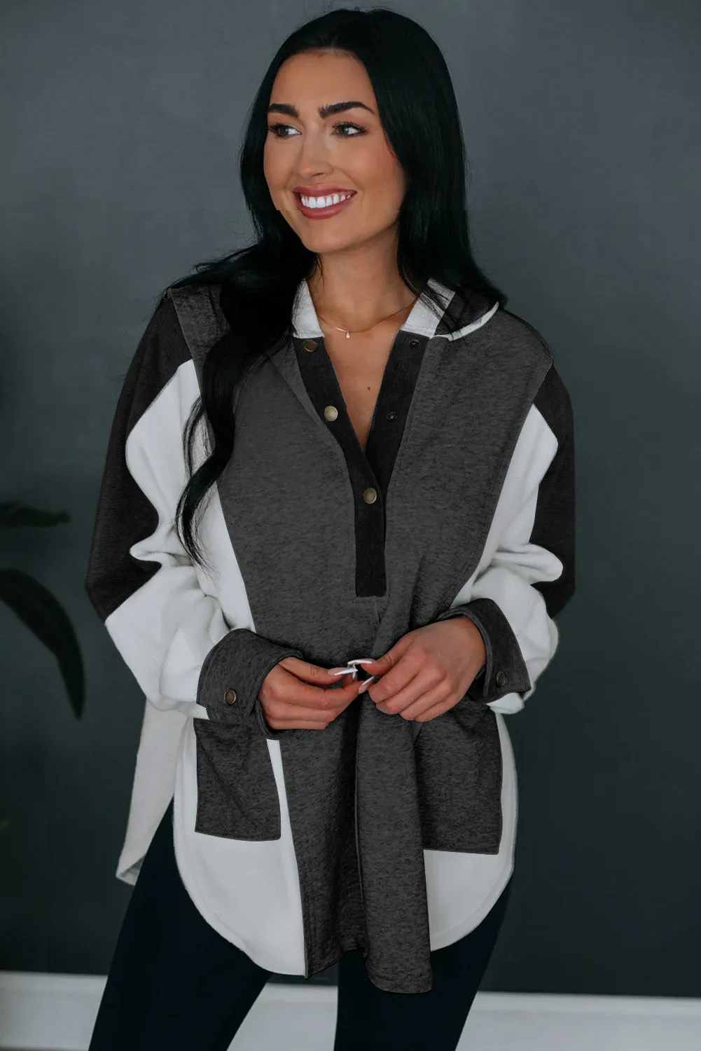 Black Color Block Exposed Seam Buttoned Neckline Hoodie